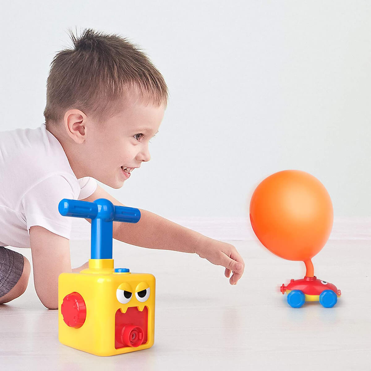 Mini Air Powered Cartoon Balloon Car Toy