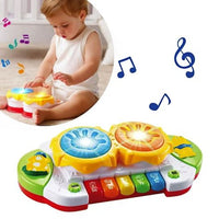 Toddlers Hand Patting Musical Drum With Piano Key