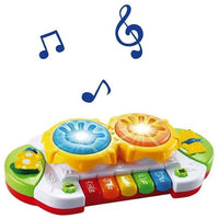 Toddlers Hand Patting Musical Drum With Piano Key