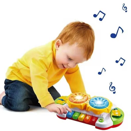 Toddlers Hand Patting Musical Drum With Piano Key