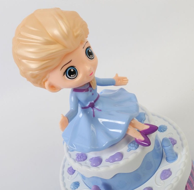 Light & Musical Rotating Cake Girl