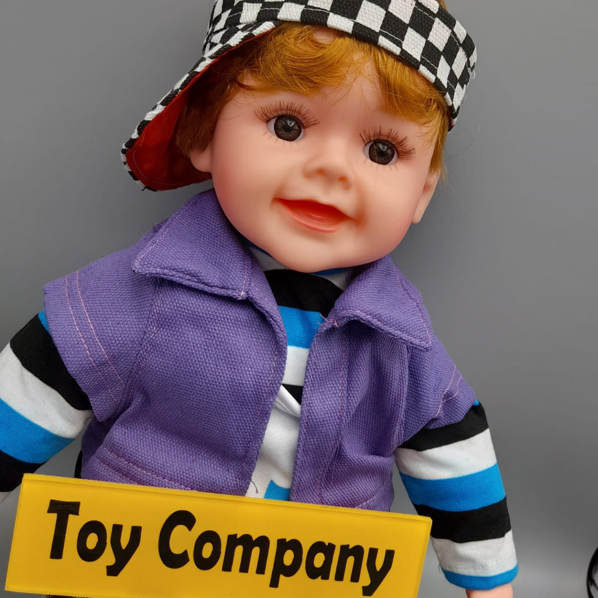 Stuffed Boy Doll With Check Dress